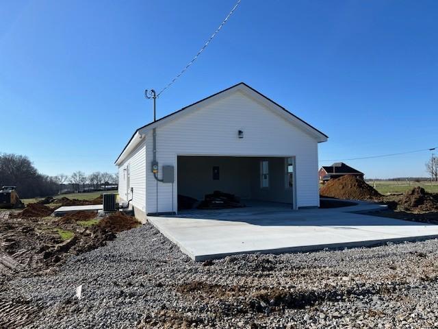 detached garage with central air condition unit