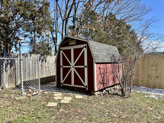 view of shed featuring a fenced backyard