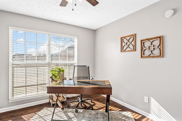 office with ceiling fan, a textured ceiling, baseboards, and wood finished floors