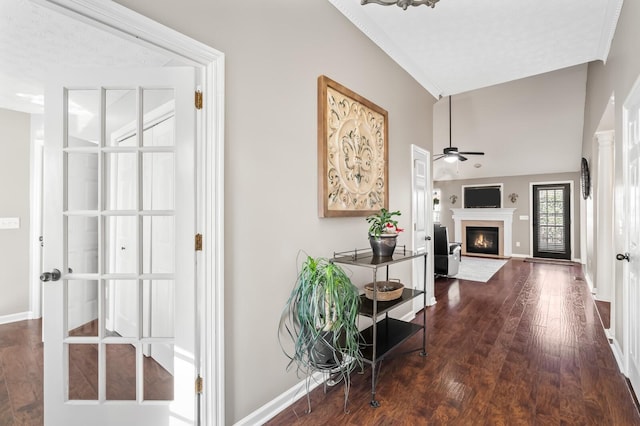 hall with baseboards and dark wood-style flooring