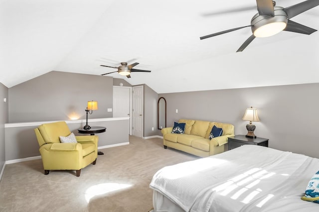 carpeted bedroom featuring vaulted ceiling, ceiling fan, and baseboards