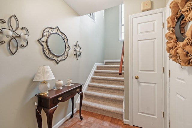 staircase with baseboards