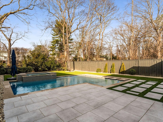 view of swimming pool with a fenced in pool, a patio area, a fenced backyard, and an in ground hot tub