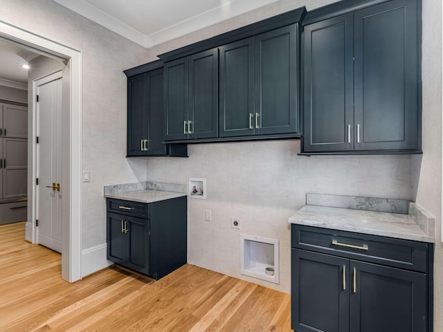 kitchen featuring baseboards, ornamental molding, light stone counters, and light wood-style floors