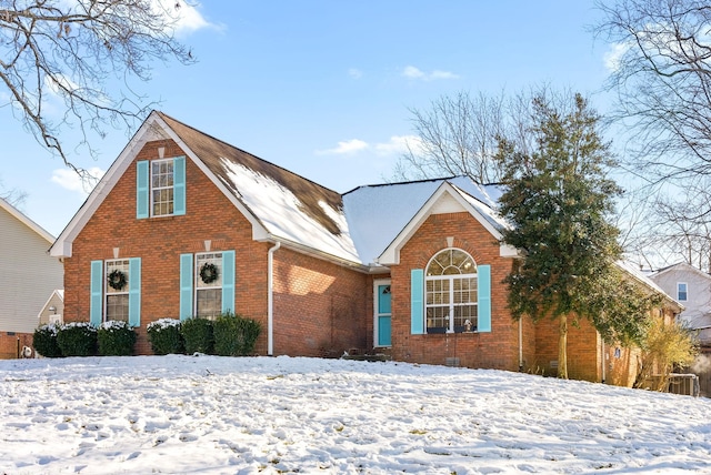 view of front of home with brick siding