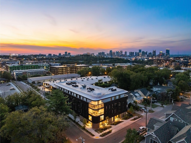 aerial view at dusk with a city view