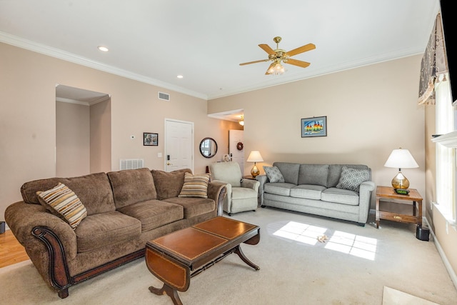 living area featuring recessed lighting, visible vents, ceiling fan, and ornamental molding