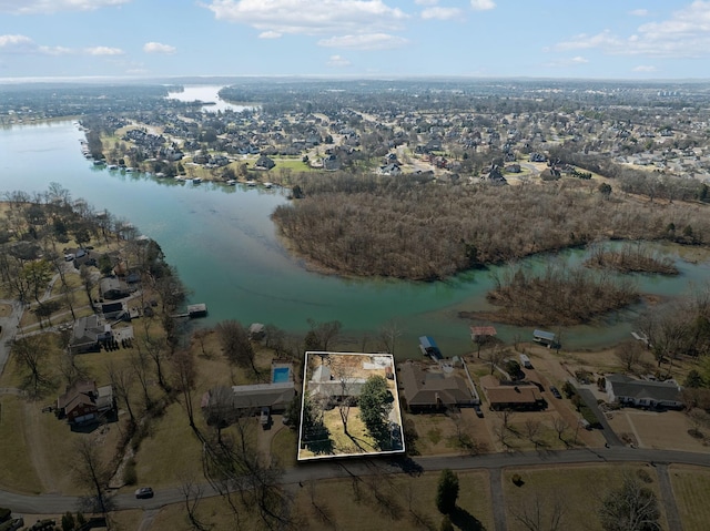 drone / aerial view with a water view