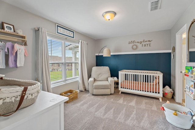 805 Coronation Dr, Antioch, TN 37013 - bedroom featuring light carpet, visible vents, and a crib