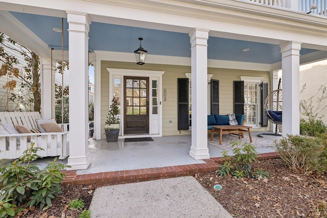 doorway to property with a porch