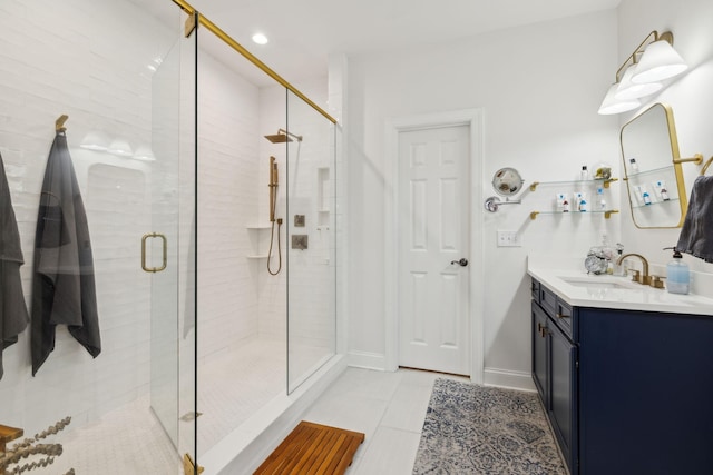 full bath with tile patterned flooring, recessed lighting, vanity, baseboards, and a shower stall