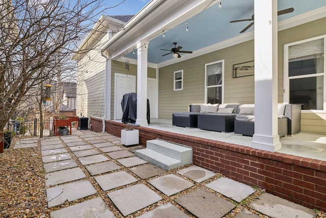 view of patio with ceiling fan, fence, and outdoor lounge area