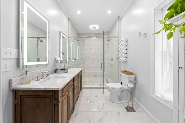 full bath featuring toilet, vanity, baseboards, a shower stall, and crown molding