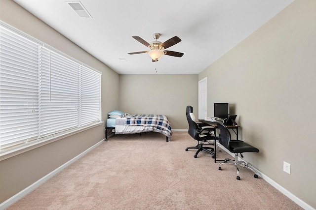 bedroom with light carpet, baseboards, and visible vents