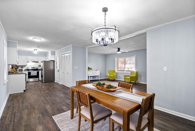 dining space with dark wood-type flooring, ornamental molding, a textured ceiling, and baseboards