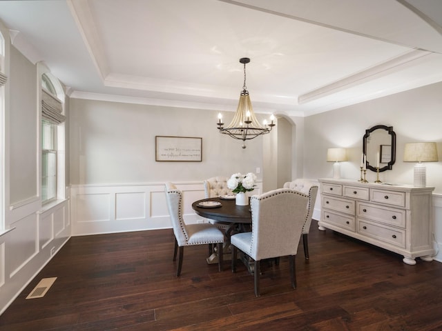 5562 Hardeman Springs Blvd, Arrington, TN 37014 - dining area featuring a tray ceiling, a chandelier, crown molding, wainscoting, and dark wood-style flooring