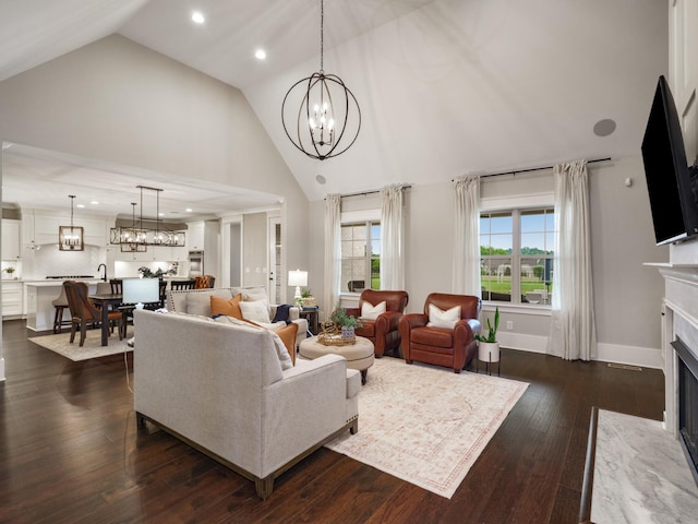 5562 Hardeman Springs Blvd, Arrington, TN 37014 - living room with a chandelier, a fireplace, dark wood-type flooring, recessed lighting, and high vaulted ceiling