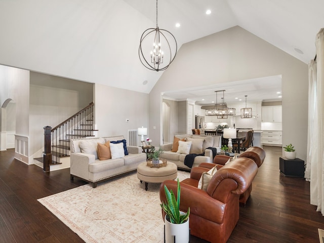 5562 Hardeman Springs Blvd, Arrington, TN 37014 - living room featuring a chandelier, high vaulted ceiling, dark wood finished floors, stairs, and recessed lighting