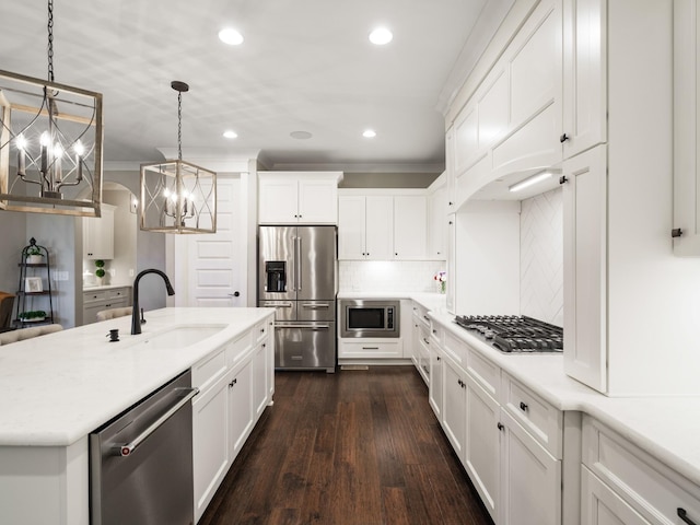 5562 Hardeman Springs Blvd, Arrington, TN 37014 - kitchen featuring appliances with stainless steel finishes, a sink, a chandelier, recessed lighting, and white cabinets
