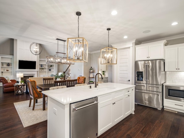 5562 Hardeman Springs Blvd, Arrington, TN 37014 - kitchen featuring appliances with stainless steel finishes, a sink, recessed lighting, a center island with sink, and open floor plan
