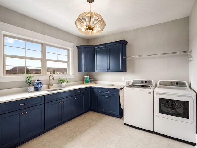 5562 Hardeman Springs Blvd, Arrington, TN 37014 - laundry room featuring cabinet space, washing machine and clothes dryer, a chandelier, and light tile patterned flooring