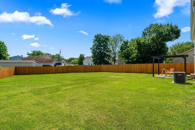 view of yard featuring a pergola, a fenced backyard, and central AC unit