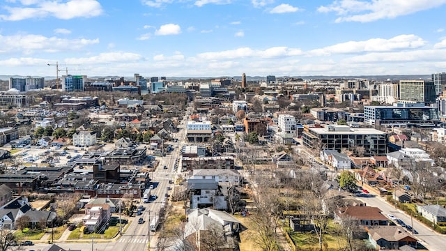 birds eye view of property featuring a view of city