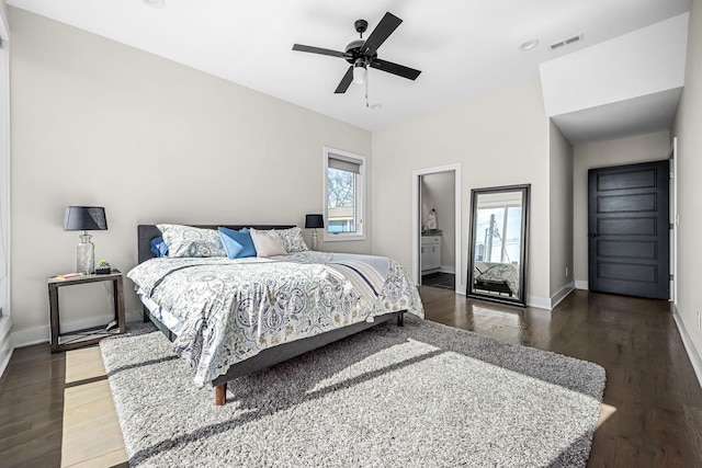 bedroom featuring baseboards, visible vents, ceiling fan, and dark wood-style flooring