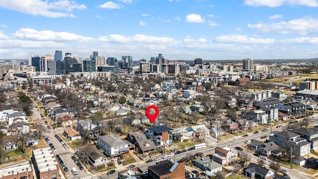 birds eye view of property with a city view