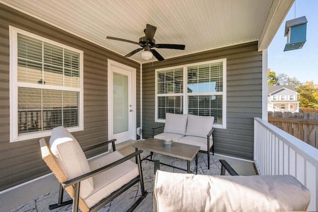 exterior space featuring outdoor lounge area and ceiling fan