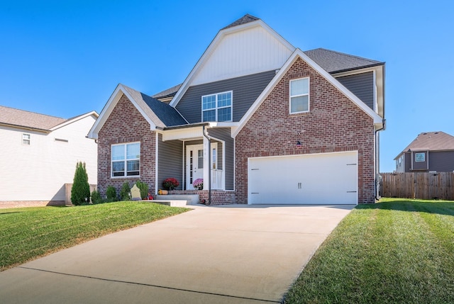 traditional home featuring concrete driveway, brick siding, a front lawn, and fence