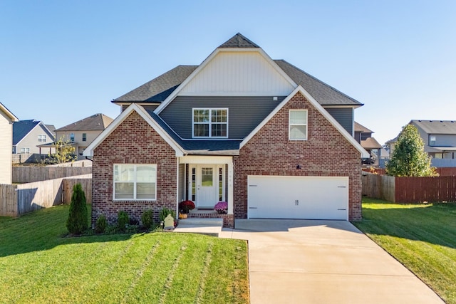 view of front of home featuring driveway, brick siding, fence, and a front yard