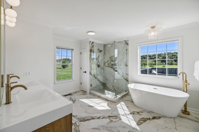 bathroom featuring marble finish floor, a soaking tub, a marble finish shower, double vanity, and crown molding