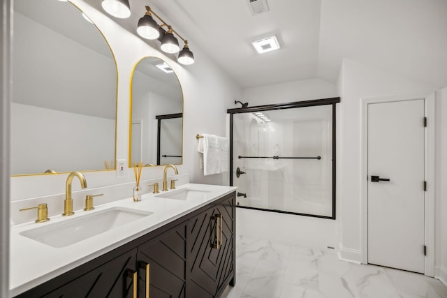 full bathroom with marble finish floor, shower / bath combination with glass door, a sink, and visible vents