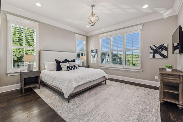 bedroom featuring baseboards, dark wood-type flooring, multiple windows, and crown molding