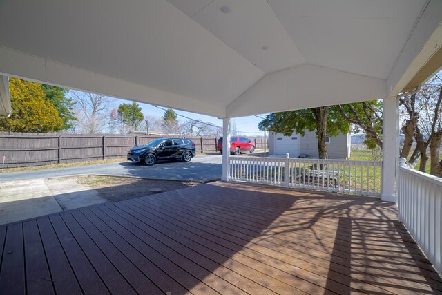 wooden deck featuring fence