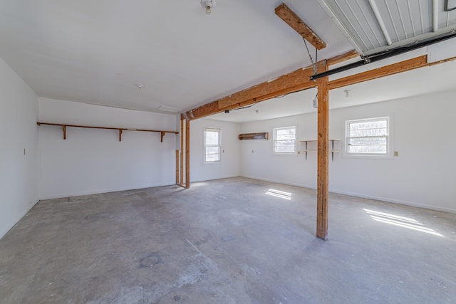 garage featuring baseboards