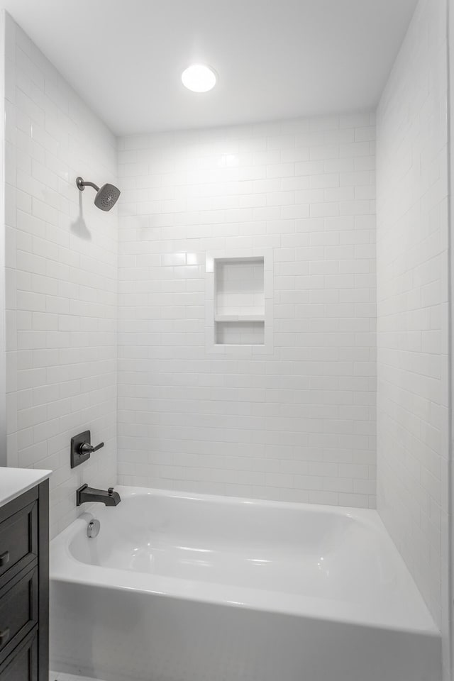 full bath with vanity and shower / bathtub combination