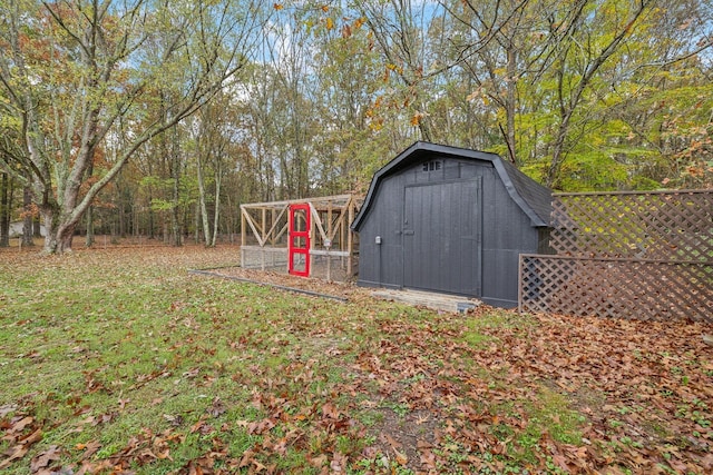 view of poultry coop featuring fence