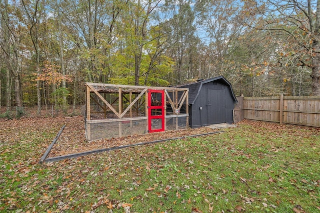 view of poultry coop featuring a fenced backyard