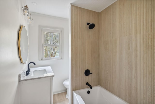 full bath with toilet, shower / tub combination, crown molding, and vanity