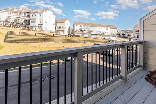 balcony featuring a residential view