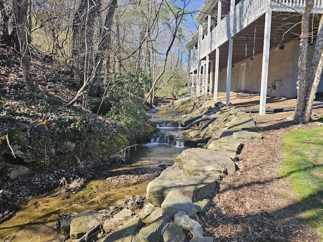 view of yard with a wooden deck