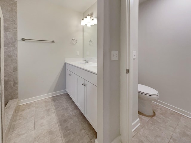 full bath featuring tile patterned flooring, toilet, a sink, baseboards, and double vanity