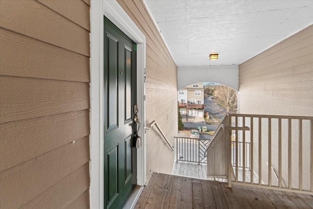 entrance to property featuring a balcony