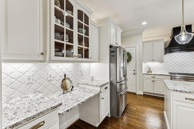 kitchen featuring stainless steel appliances, decorative light fixtures, glass insert cabinets, and premium range hood