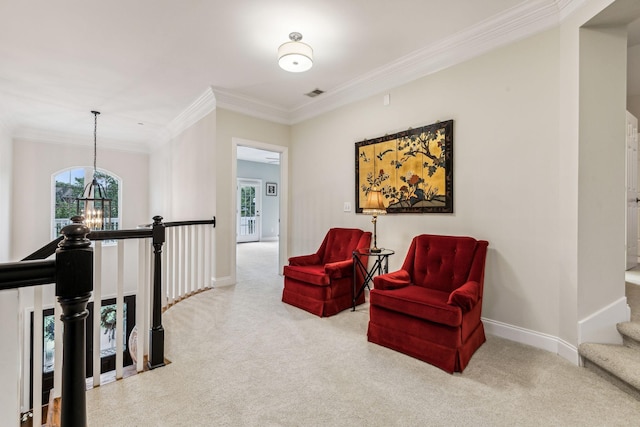 living area with light carpet, baseboards, visible vents, and a notable chandelier