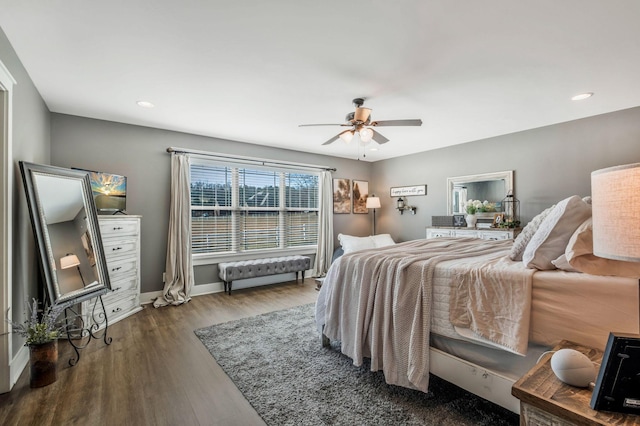 bedroom featuring recessed lighting, wood finished floors, a ceiling fan, and baseboards