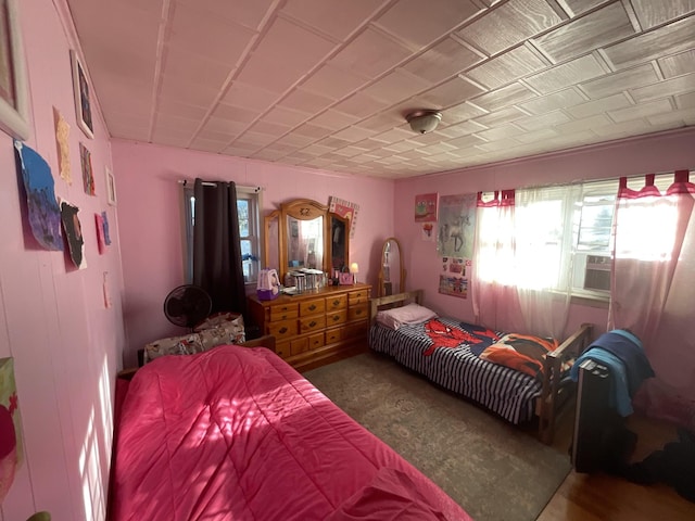 bedroom featuring cooling unit