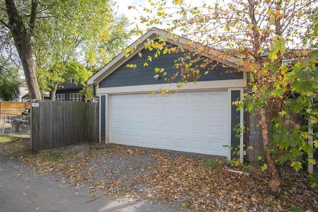 detached garage with fence